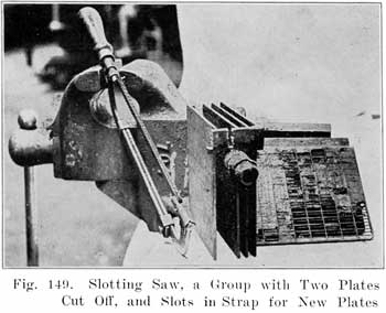 Fig. 149 Slotting saw, a group with two plates cut off, and slots in strap for new plates