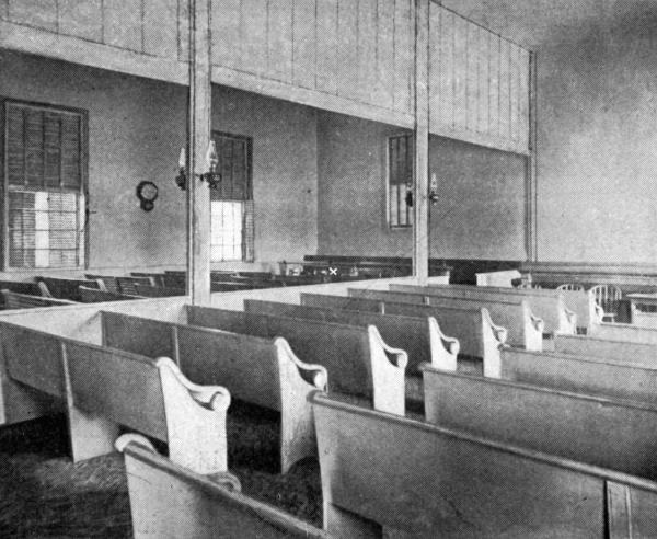INTERIOR OF FRIENDS' MEETING-HOUSE
Whittier's usual seat marked, on left side, near "facing seats."