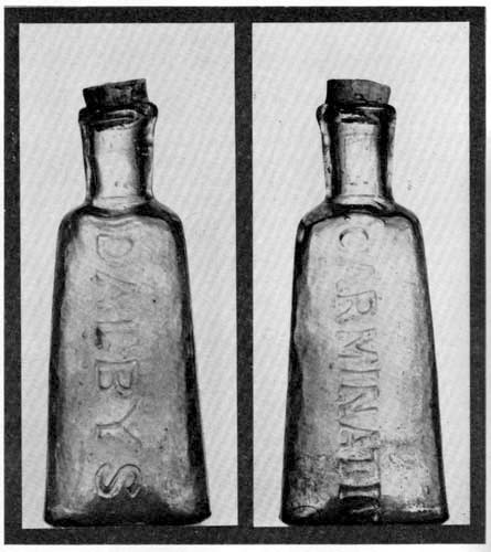 Two sides of a Dalby's Carminative bottle