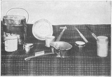 German Army cooking kit after use in five campaigns.  All of
these articles pack inside the kettle