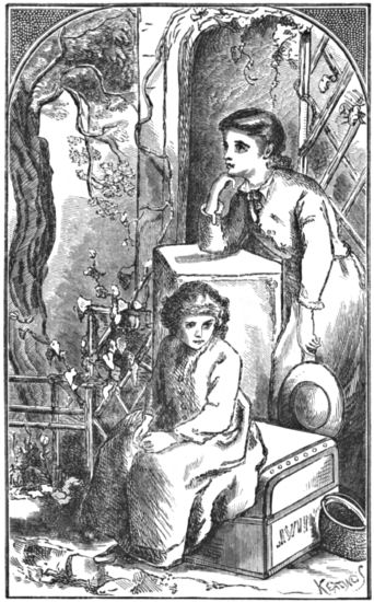 Two girls looking thoughtful; one of them is sitting on a clothes trunk