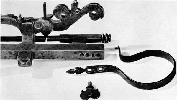 Figure 6.—Work spindle and its nut removed from the
machine to illustrate how easily another spindle and nut of different
pitch could be substituted. (Smithsonian photo 46525C.)