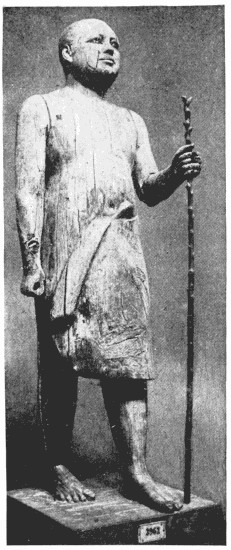 THE WOODEN MAN Gizeh Museum, near Cairo.—According to the chronological table of
Marlette, this statue is over 6000 years old.—From a photograph by
Brugsch Bey