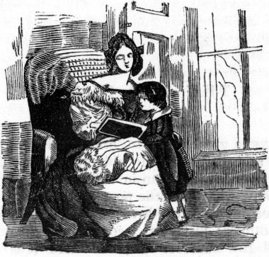 Woman in chair reading book to child who is standing beside her.