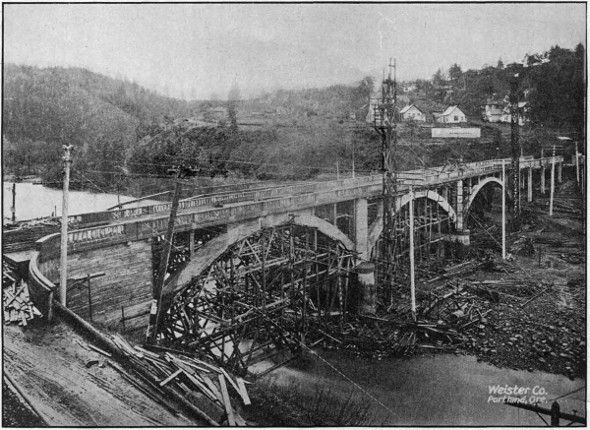 REINFORCED
CONCRETE BRIDGE OVER HOOD RIVER, NEARING COMPLETION, ON THE COLUMBIA RIVER HIGHWAY AT HOOD RIVER CITY. BUILT IN 1918.