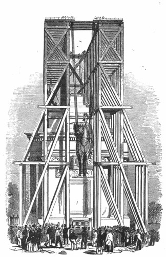 HOISTING THE STATUE TO THE TOP OF THE ARCH.

From the "Illustrated London News."