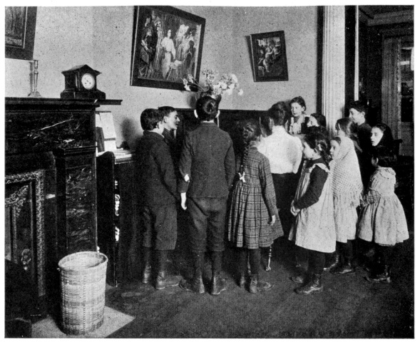 THE CHILDREN'S HOUR AT THE COLLEGE SETTLEMENT.