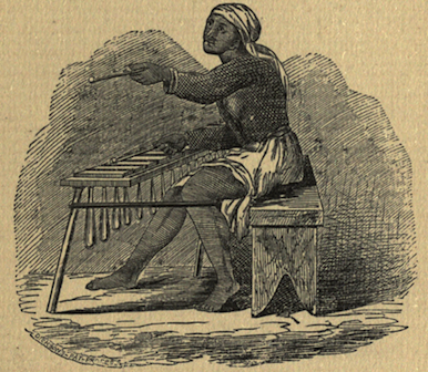 A MARIMBA PLAYER AND HIS INSTRUMENT.