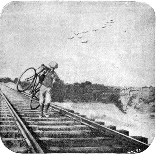 HOW WE CARRIED OUR BICYCLES OVER THE RAILWAY BRIDGES.