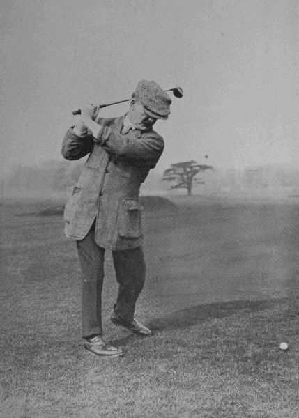 PLATE V.

J. H. TAYLOR

At the top of his swing in the drive. Note here the position of
Taylor's wrists. This is a matter of the utmost importance. Taylor is
at times inclined to get a little on to his right leg, but probably
here the weight is at least equally distributed, if not mainly on the
left.