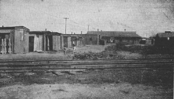A RAILROAD CAMP FOR IMMIGRANT WORKERS IN A PROSPEROUS SUBURBAN
COMMUNITY, 1920