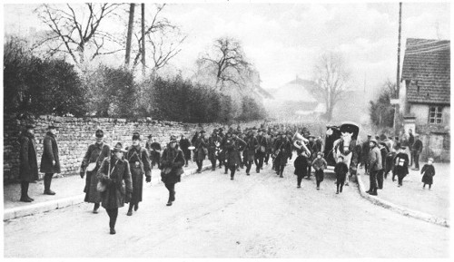 A photograph, full of human interest, showing Americans, headed by a regimental band, marching to the front in France