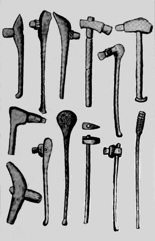 AXES FROM LAKE-DWELLINGS SHOWING ATTACHMENT TO HANDLES