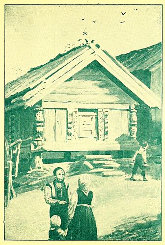 People in front of a cabin