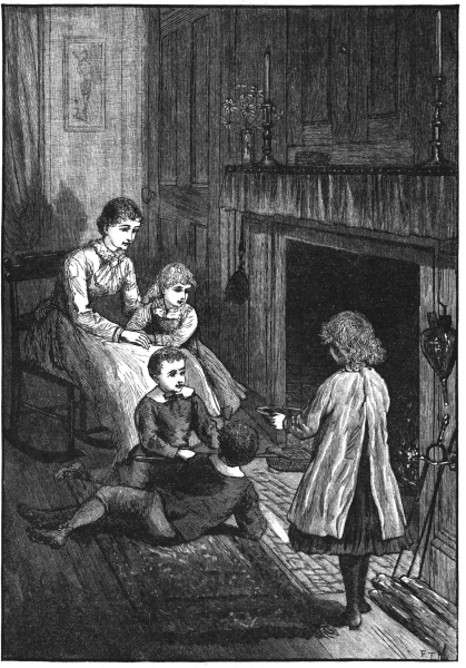 Mother and children popping corn over a fire