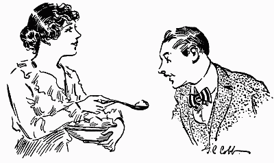 woman feeding a man a spoonful of taffy