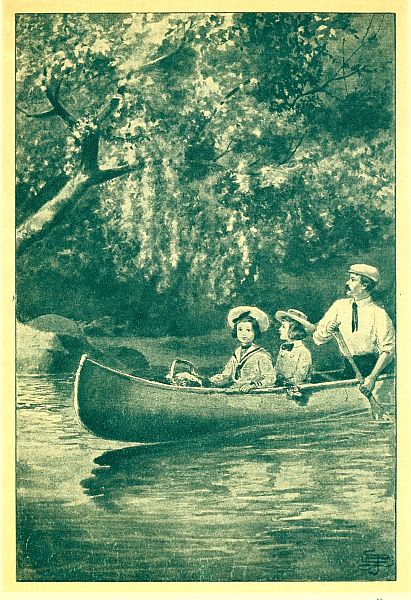 two children and man in canoe