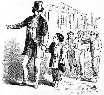 man walking holding boys hand; other boys watching and pointing