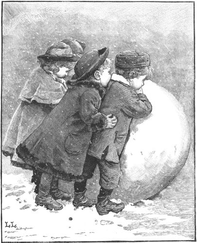 three children rolling a huge snowball