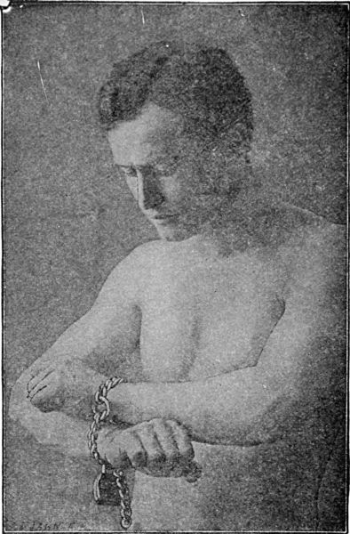 Houdini, as Chained and Handcuffed Before the Judges in
the First Trial of His Action Against the Royal Police of Cologne.