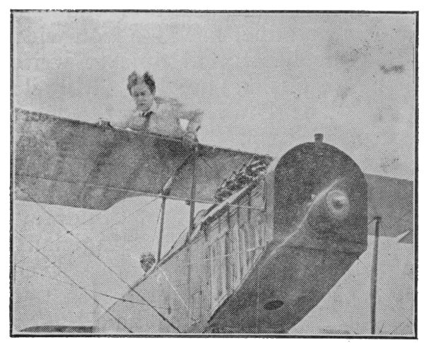 Houdini on wing of airplane
