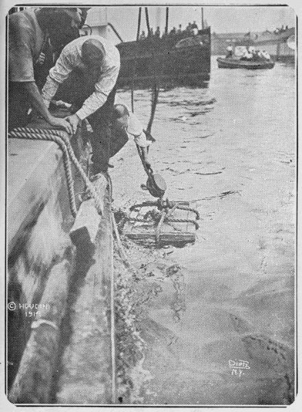 Packing case containing six
hundred pounds of iron weights and Houdini, as it was dropped into New
York Bay