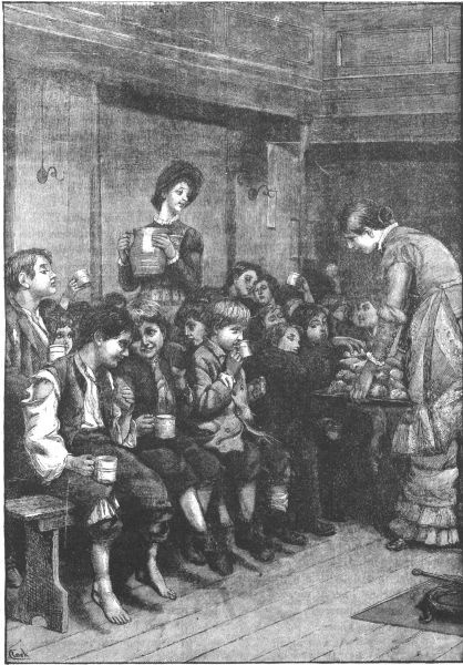 group of children being served by two women