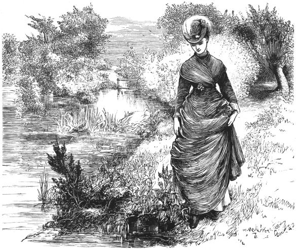 woman walking by water