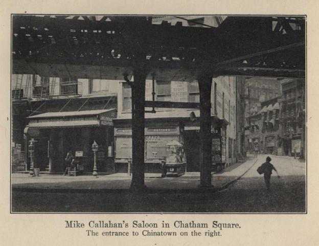Mike Callahan's Saloon in Chatham Square. The entrance to Chinatown on the right.