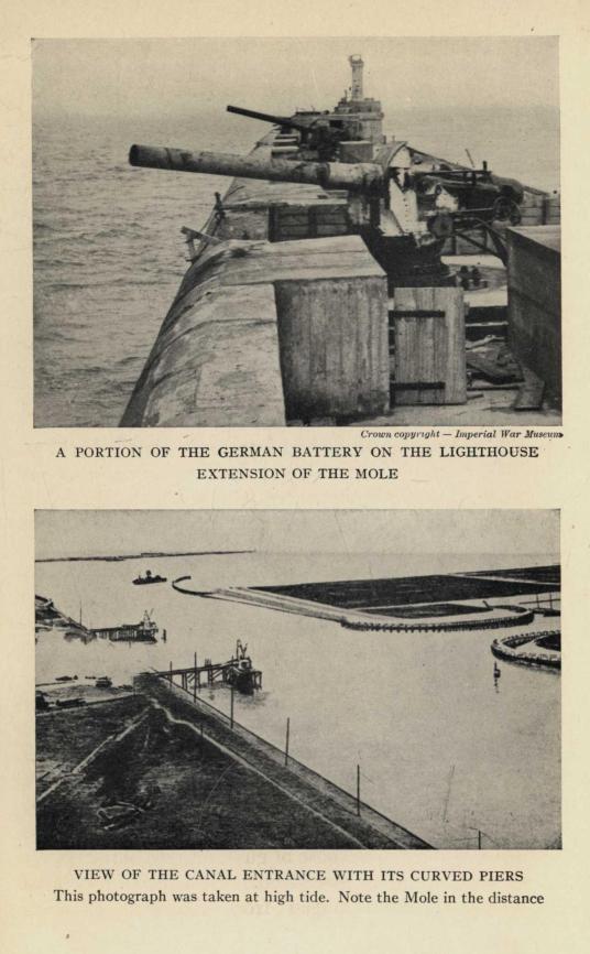 A PORTION OF THE GERMAN BATTERY ON THE LIGHTHOUSE EXTENSION OF THE MOLE. VIEW OF THE CANAL ENTRANCE WITH ITS CURVED PIERS. This photograph was taken at high tide. Note the Mole in the distance