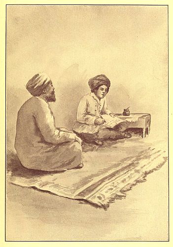 Boy and man sitting on rug