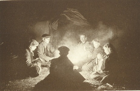 Round the camp-fire.  Photo. F. R. Hinkins