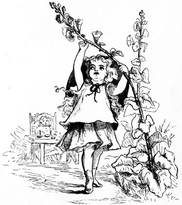 girl pulling down a large hollyhock