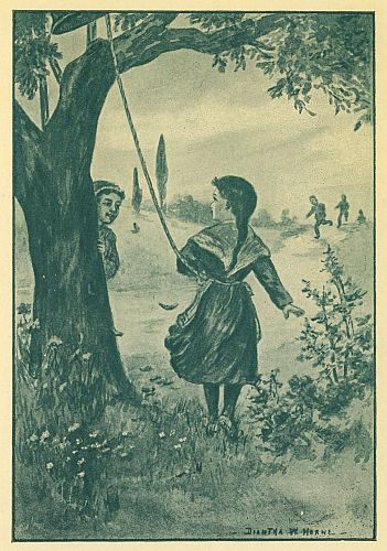 girl under tree pulling rope