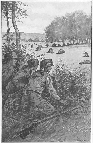 two men crouched in brush looking at open plain