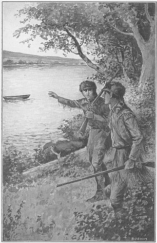 one man pointing down river with other man watching