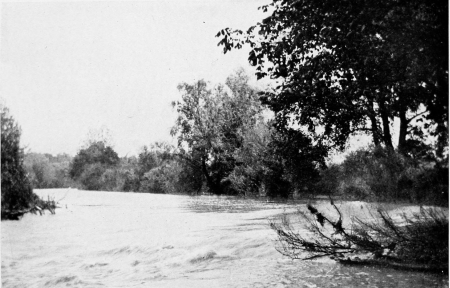 The Little Miami River at Eureka Mills, twelve miles
east of Dayton. Here the ruin of the dam, which served the mills run by
Mr. Howells’s father, makes a rapid in the stream.