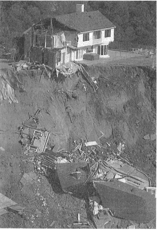 Home damaged by landslide triggered by the 1989 Loma Prieta shock.