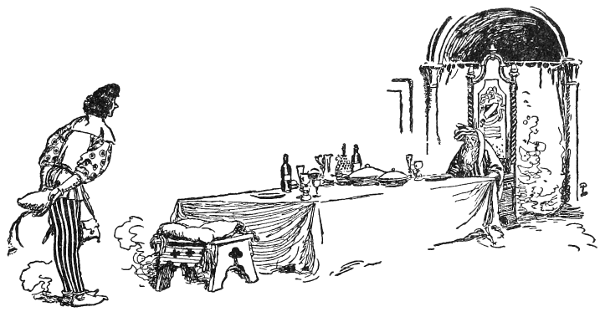little old man at a table spread with a feast
