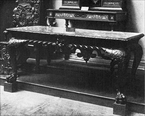 Figure 25. CHIPPENDALE MARBLE-TOPPED TABLE.