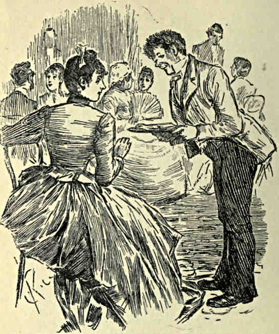Waiter offering refreshment to a lady