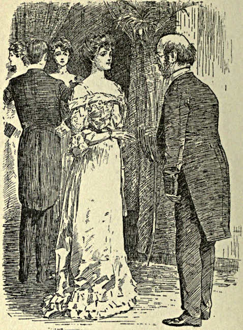 Lady greeting a gentleman at a party