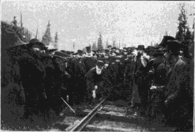 LORD STRATHCONA DRIVING THE GOLDEN SPIKE COMPLETING THE CANADIAN PACIFIC RAILROAD AT CRAIGENACHEE, NOVEMBER 7, 1885.