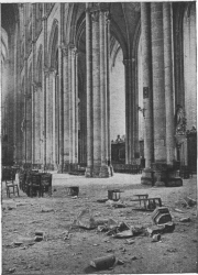 EFFECT OF THE FIRST SHELLS WHICH
HIT THE CATHEDRAL.
ASPECT INSIDE THE NAVE.