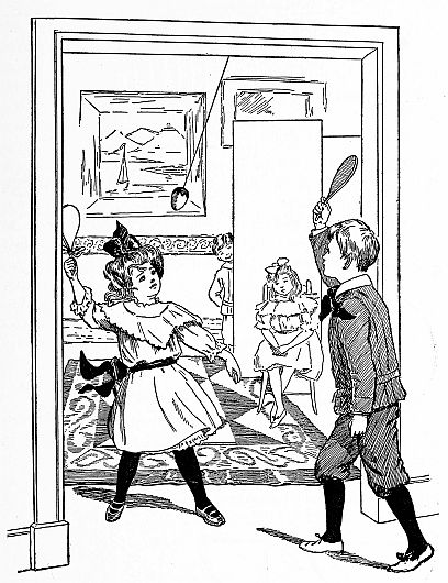 two children batting at egg hung in doorway