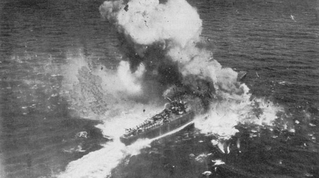 JAPANESE CONVOY UNDER ATTACK in Ormoc Bay. A destroyer escort is blown apart by a direct hit (above), and a large transport is straddled by bomb bursts (below).