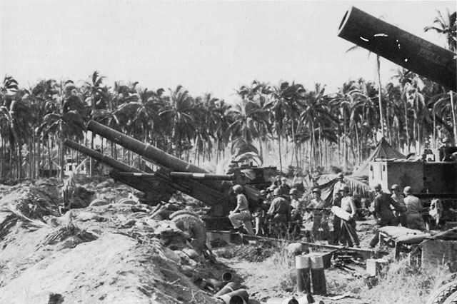 8-INCH HOWITZERS READIED FOR ACTION against an enemy strong point southwest of Tacloban.