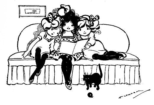 three girls on sofa holding book sitting on sofa, kitten on floor