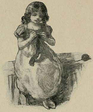 girl sitting on bed sewing