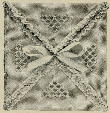photo of square sachet, looks like very pretty envelope tied with ribbon